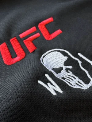 UFCThreeReapersTrackJacketEmbroi-1.webp